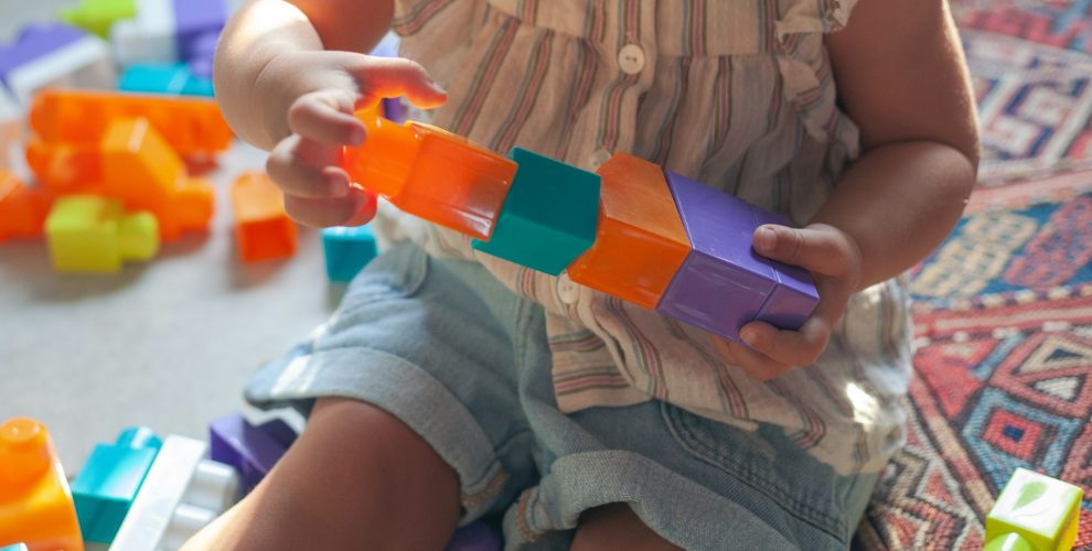 Brain training in Singapore Baby play with toys